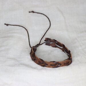 Woven black and brown lether adjustable cuff bracelet